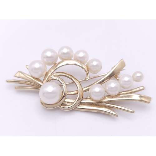 2 - A 9k Yellow Gold and Pearl Decorative Floral Brooch. 5cm. 8g weight