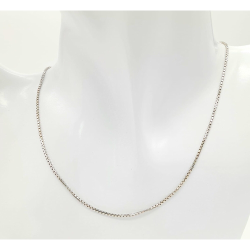 23 - An 18K White Gold Link Necklace. Small rectangular links. 
40cm. 4.56g weight.