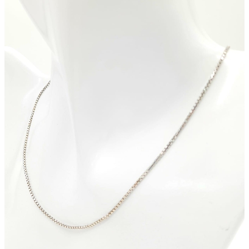 23 - An 18K White Gold Link Necklace. Small rectangular links. 
40cm. 4.56g weight.