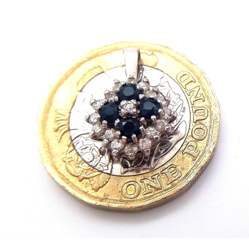 30 - A 9K Gold Diamond and Sapphire Pendant with Matching Stud Earrings.  17mm pendant. 2.55g total weigh... 