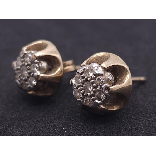 33 - A Pair of Vintage 9K Yellow Gold and Diamond Stud Earrings. 3.3g total weight.