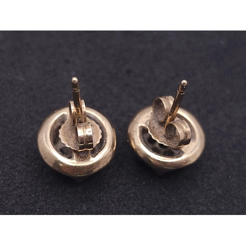 33 - A Pair of Vintage 9K Yellow Gold and Diamond Stud Earrings. 3.3g total weight.