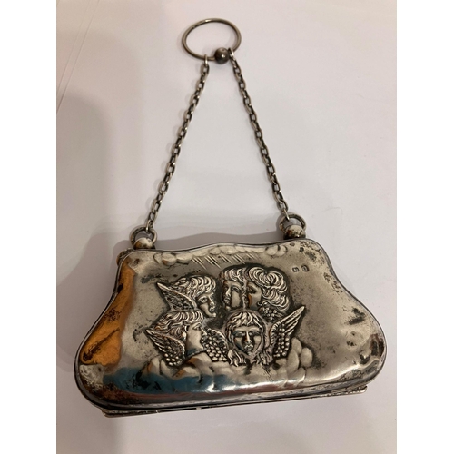 35 - Antique SILVER EVENING PURSE Having cherub detail with silk taffeta lining. Clear hallmark for Henry... 