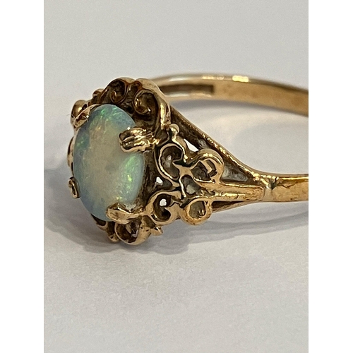 434 - Vintage 9 carat GOLD and OPAL RING. Consisting a fire OPAL set in a  Classic rococo scroll mount. Fu... 