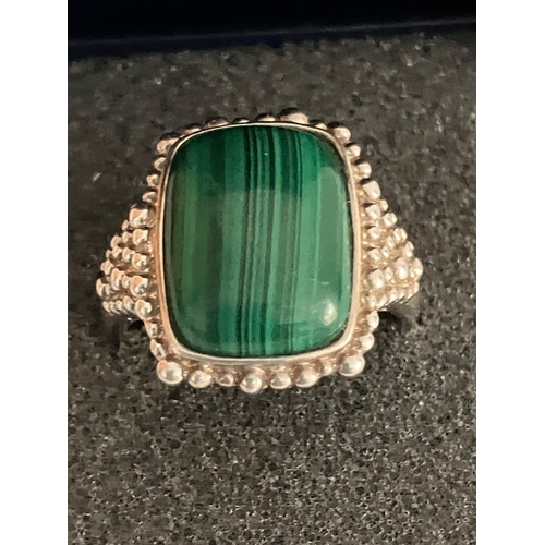 476 - SILVER RING with polished MALACHITE set to top. Beautiful SILVER beadwork surround. Complete with ri... 