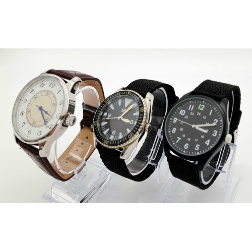 498 - A Parcel of Three Military design Homage Watches Comprising; 
1) Japanese Pilots Watch (46mm Case), ... 