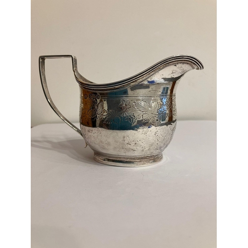 591 - Antique SILVER CREAM JUG with beautiful chased foliage design. Clear hallmark for John   Round Sheff... 