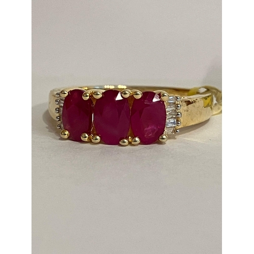 605 - Stunning RUBY and DIAMOND RING set in SILVER with 18 ct GOLD overlay. Complete with ring box. Condit... 