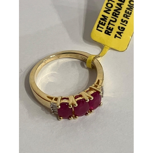 605 - Stunning RUBY and DIAMOND RING set in SILVER with 18 ct GOLD overlay. Complete with ring box. Condit... 