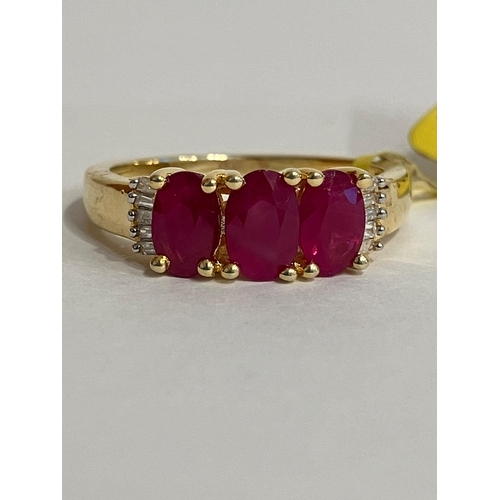 605 - Stunning RUBY and DIAMOND RING set in SILVER with 18 ct GOLD overlay. Complete with ring box. Condit... 