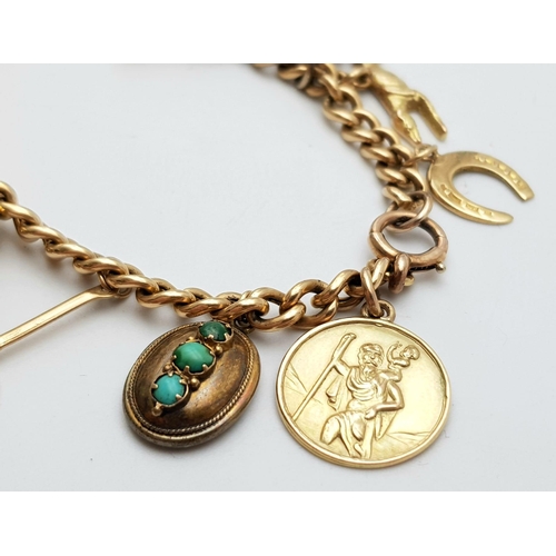 64 - A Vintage 9K Yellow Gold Charm Bracelet. Includes: Diamond heart, carnelian fob and St Christopher. ... 