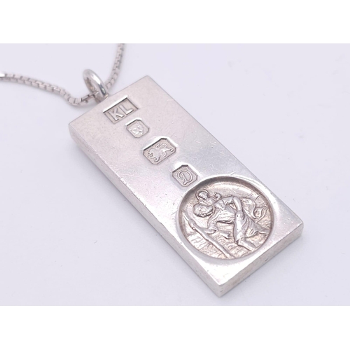 71 - A Sterling Silver St. Christopher Ingot Pendant on a Silver Necklace. 5cm - pendant. 58cm necklace l... 