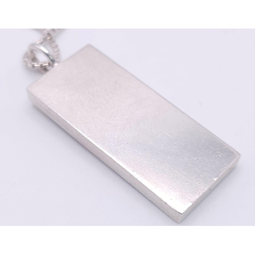 71 - A Sterling Silver St. Christopher Ingot Pendant on a Silver Necklace. 5cm - pendant. 58cm necklace l... 