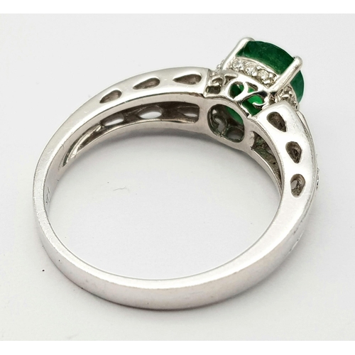 236 - 14K WHITE GOLD DIAMOND & EMERALD RING, WITH APPROX 0.75CT OVAL EMERALD CENTRE, WEIGHT 3.8G SIZE N