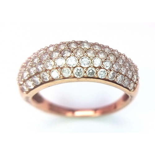 316 - A 9K Rose Gold Diamond Encrusted Ring. Five rows of 70 small cut round diamonds. Size N. 3.2g total ... 