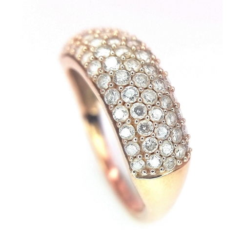 316 - A 9K Rose Gold Diamond Encrusted Ring. Five rows of 70 small cut round diamonds. Size N. 3.2g total ... 