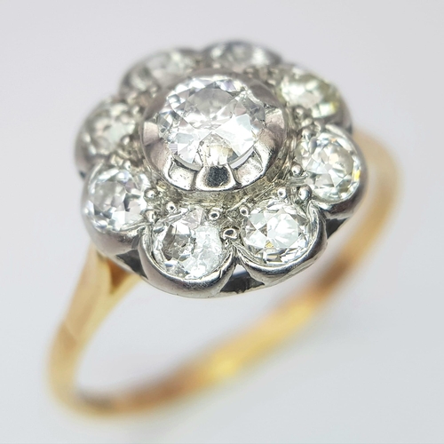 74 - An 18 K yellow gold ring with a large diamond cluster, size: T, weight: 3.4 g.