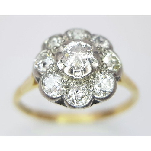 74 - An 18 K yellow gold ring with a large diamond cluster, size: T, weight: 3.4 g.