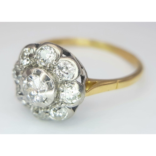 74 - An 18 K yellow gold ring with a large diamond cluster, size: T, weight: 3.4 g.