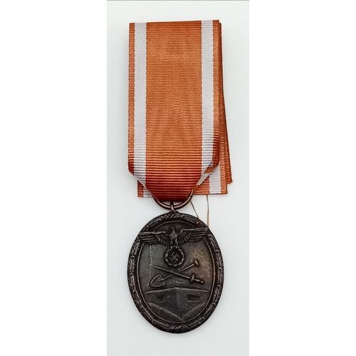 777 - 3rd Reich West Wall Medal (Deutsches Schutzwall-Ehrenzeichen). Given to those who worked on Germany'... 