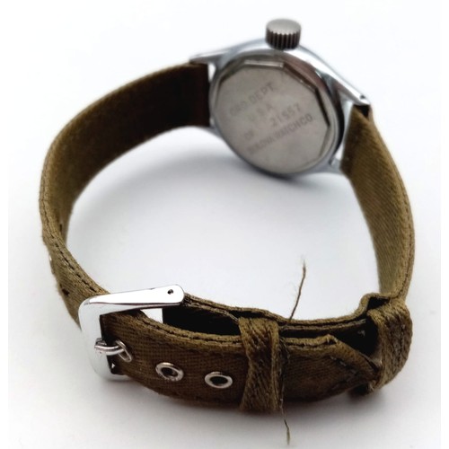 206 - A Vintage (1940s) Military Style Bulova Mechanical Gents Watch. Green textile strap. Stainless steel... 