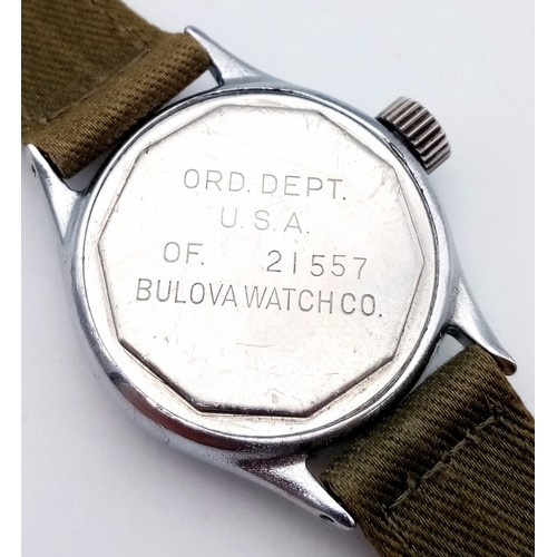 206 - A Vintage (1940s) Military Style Bulova Mechanical Gents Watch. Green textile strap. Stainless steel... 