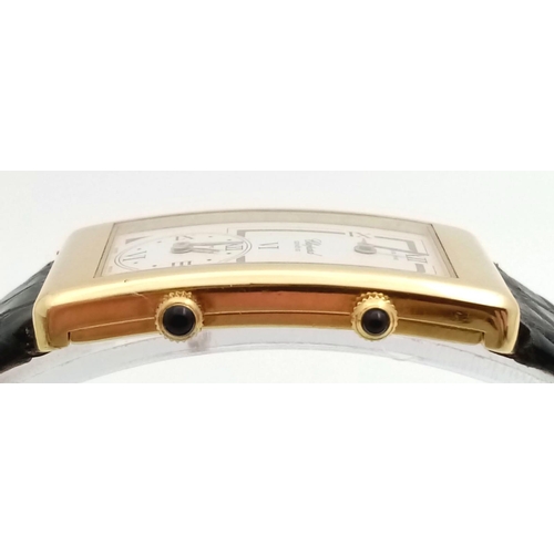 102 - A Chopard 18K Gold Home Time (Dual Time) Gents Watch. Black leather strap. 18K gold rectangular case... 