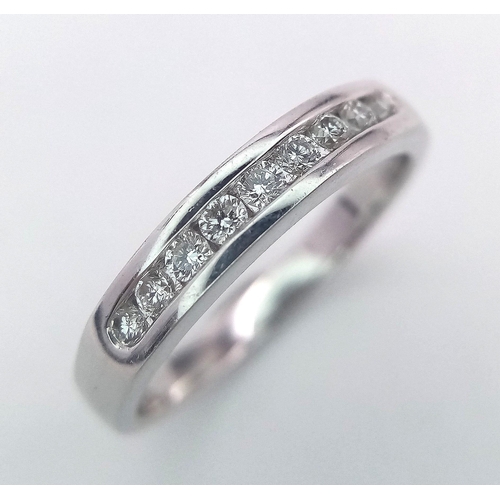 229 - 18K WHITE GOLD DIAMOND SET BAND RING, APPROX 0.20CT DIAMONDS TOTAL, WEIGHT 3.5G SIZE M