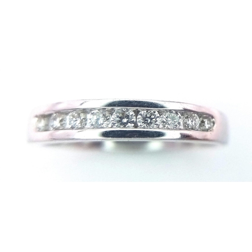 229 - 18K WHITE GOLD DIAMOND SET BAND RING, APPROX 0.20CT DIAMONDS TOTAL, WEIGHT 3.5G SIZE M