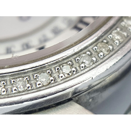 389 - A Seiko Premier Ladies Diamond Watch Case. 27mm. Diamond bezel. Mother of pearl dial. In working ord... 