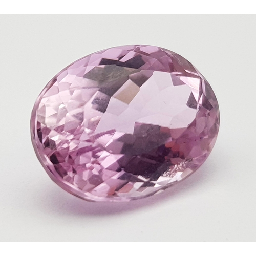 397 - A 12.13CT EYE CLEAN NATURAL OVAL KUNZITE STONE,  VERY GOOD QUALITY AND COLOUR