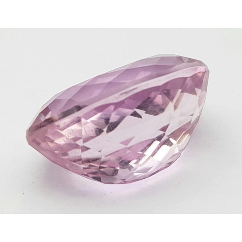 397 - A 12.13CT EYE CLEAN NATURAL OVAL KUNZITE STONE,  VERY GOOD QUALITY AND COLOUR