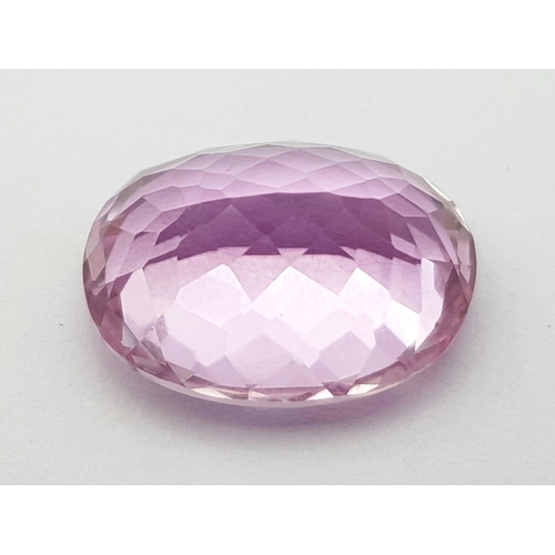 397 - A 12.13CT EYE CLEAN NATURAL OVAL KUNZITE STONE,  VERY GOOD QUALITY AND COLOUR