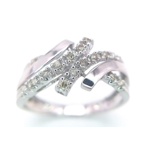 495 - A FANCY 9K WHITE GOLD DIAMOND CROSSOVER RING, APPROX 0.15CT DIAMONDS, WEIGHT 2.6G SIZE Q