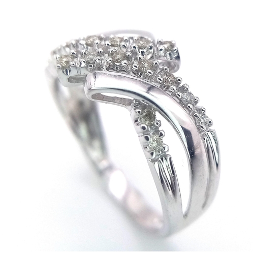 495 - A FANCY 9K WHITE GOLD DIAMOND CROSSOVER RING, APPROX 0.15CT DIAMONDS, WEIGHT 2.6G SIZE Q