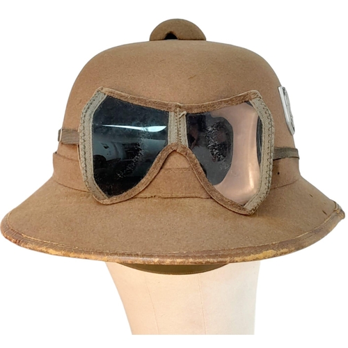 546 - WW2 Mk II German Africa Corps Tropical Helmet inc Sand Goggles. There is a small field repair to the... 