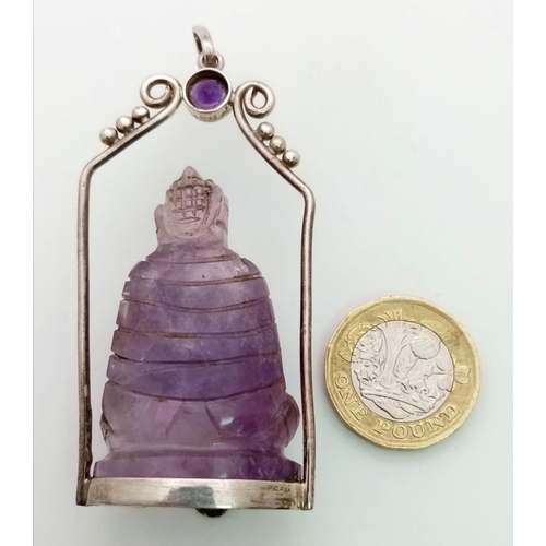 676 - A Unique Vintage Amethyst Silver Mounted Buddha/Deity Pendant. The Carved Buddha measures 4.5cm Long... 