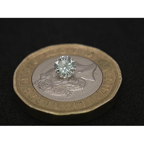 704 - A ROUND BRILLIANT CUT DIAMOND .43ct VS2 COLOUR F , WITH CERTIFICATE .