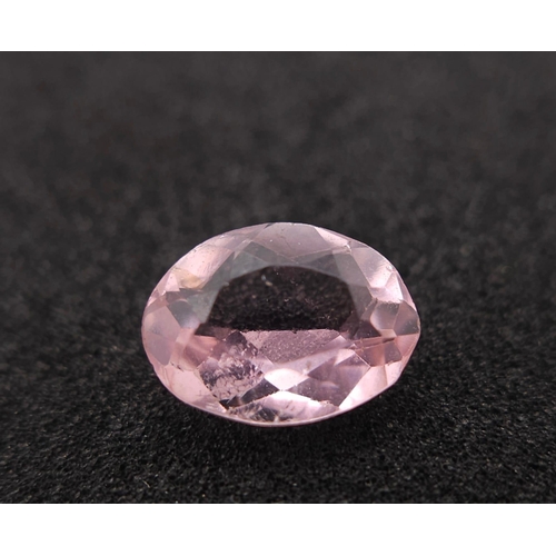 725 - AN OVAL MIXED CUT TOURMALINE  .95ct  with certificate.