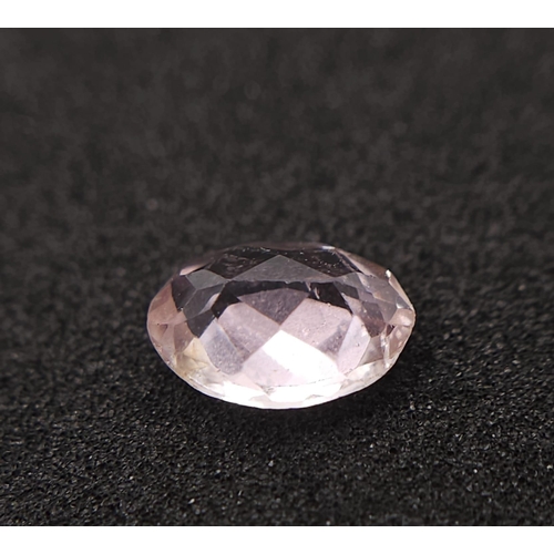 725 - AN OVAL MIXED CUT TOURMALINE  .95ct  with certificate.