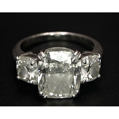 78 - A Breathtaking 4.01ct GIA Certified Diamond Ring. A brilliant cushion cut 4.01ct central diamond of ... 