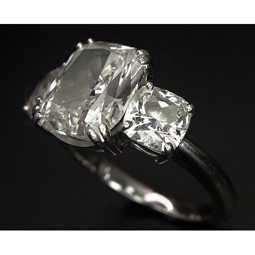 78 - A Breathtaking 4.01ct GIA Certified Diamond Ring. A brilliant cushion cut 4.01ct central diamond of ... 