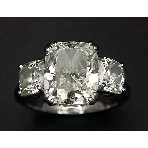 78 - A Breathtaking 4.01ct GIA Certified Diamond Ring. A brilliant cushion cut 4.01ct central diamond of ... 