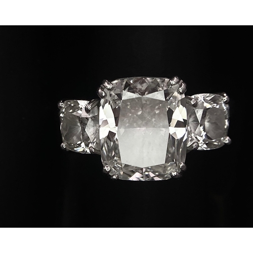 78 - A Breathtaking 4.01ct GIA Certified Diamond Ring. A brilliant cushion cut 4.01ct central diamond of ... 