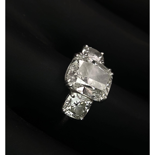 78 - A Breathtaking 4.01ct GIA Certified Diamond Ring. A brilliant cushion cut 4.01ct central diamond of ... 