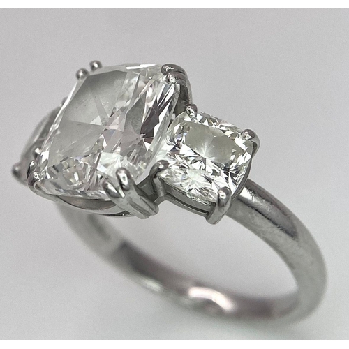 78 - A Breathtaking 4.01ct GIA Certified Diamond Ring. A brilliant cushion cut 4.01ct central diamond of ... 