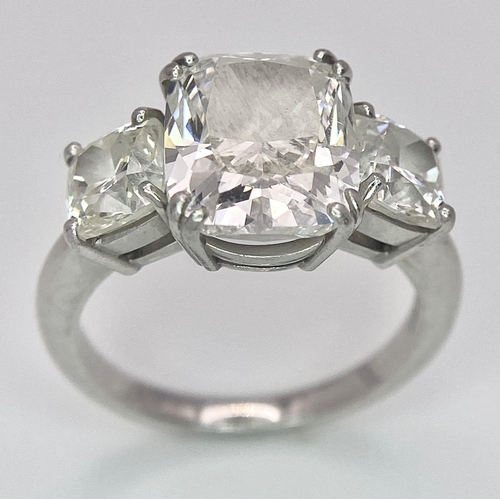 78 - A Breathtaking 4.01ct GIA Certified Diamond Ring. A brilliant cushion cut 4.01ct central diamond of ... 