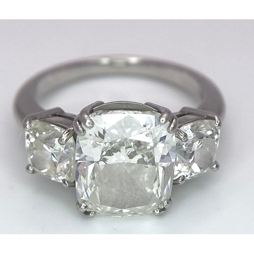 78 - A Breathtaking 4.01ct GIA Certified Diamond Ring. A brilliant cushion cut 4.01ct central diamond of ... 