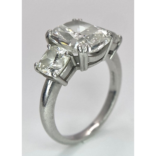 78 - A Breathtaking 4.01ct GIA Certified Diamond Ring. A brilliant cushion cut 4.01ct central diamond of ... 