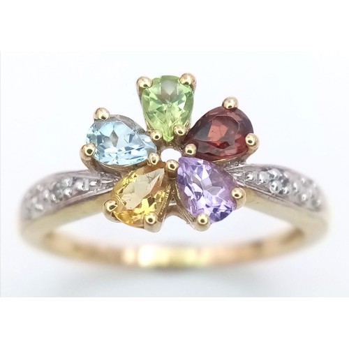 306 - A LOVELY 10K YELLOW GOLD DIAMOND AND GEMSTONE SET FANCY FLOWER DESIGN RING, WEIGHT 2.3G SIZE N